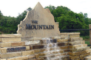 Waterfall at the gated entry of the mountain of southridge in tahlequah oklahoma